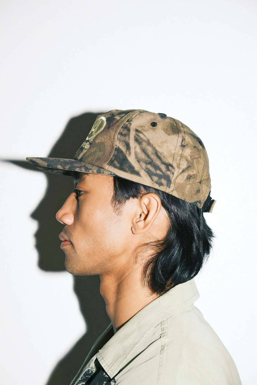Promo Hat in Tree Camo (Cream Logo)